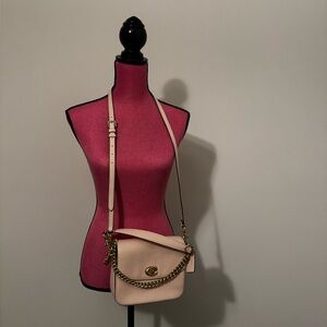 Coach Cassie Crossbody Leather Handbag. in Blush pink color
